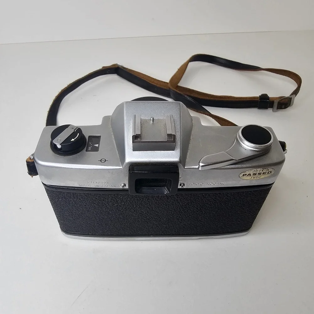 Vintage Topcon Uni 35mm SLR Camera with UV Topcor 53mm f2 Lens and Case Untested